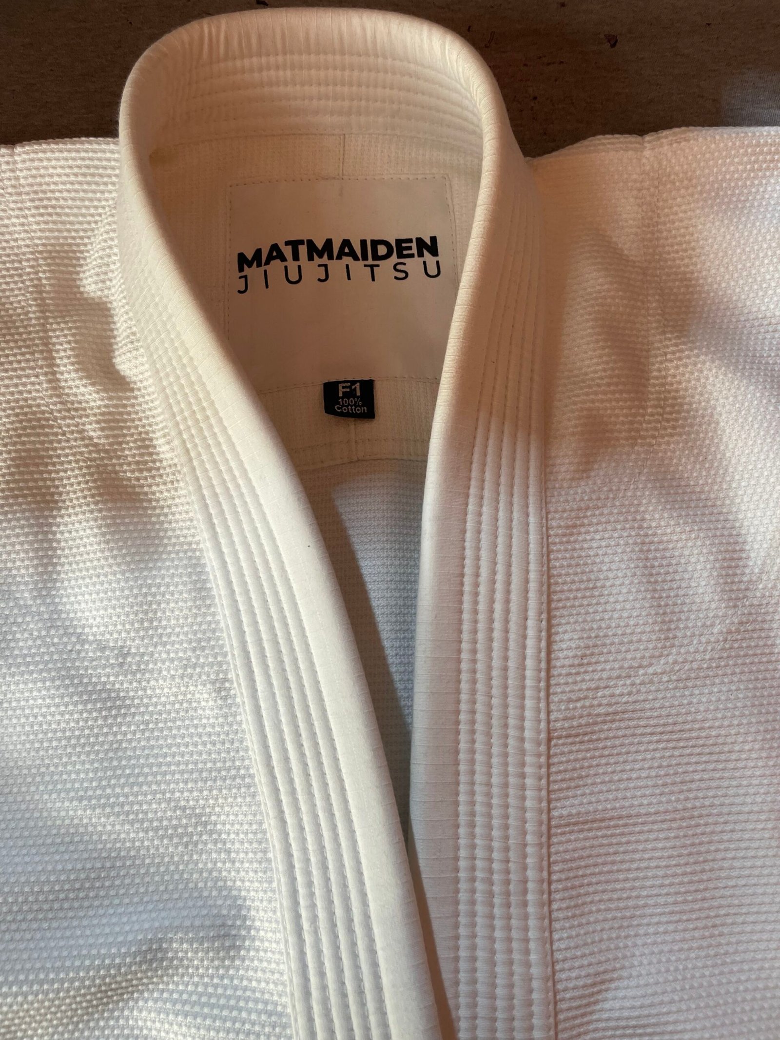 Reinforced collar and brand tag